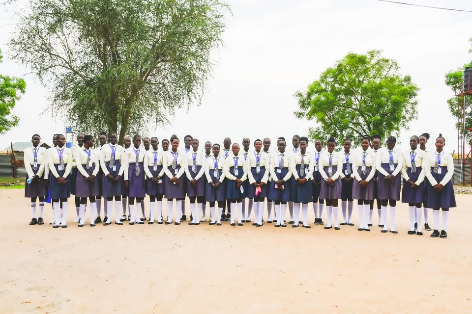Saint Andrews students standing together in school uniform